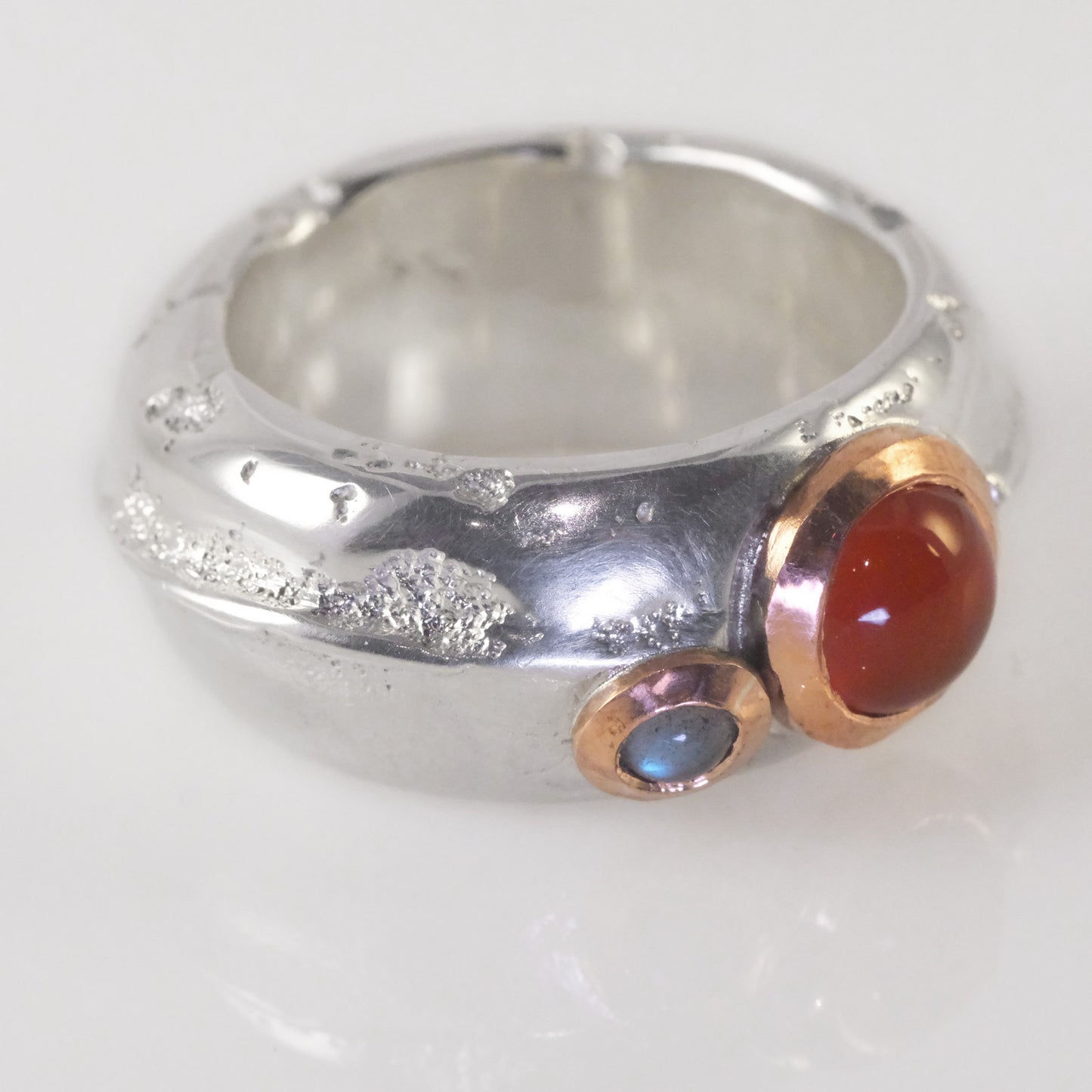 Chunky sand cast ring with carnelian and labradorite cabochons by VerdeRame Jewels