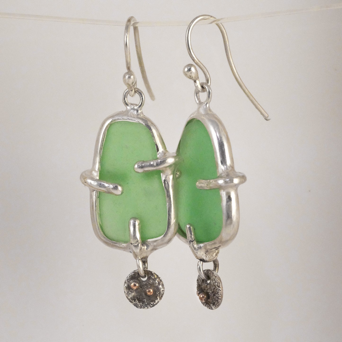 Sea glass silver dangle earrings handmade by VerdeRame Jewels