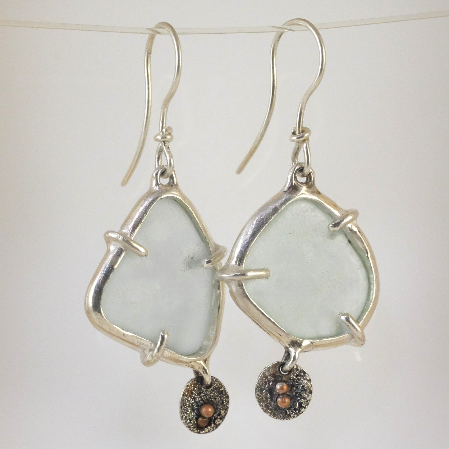 Sea glass silver dangle earrings handmade by VerdeRame Jewels