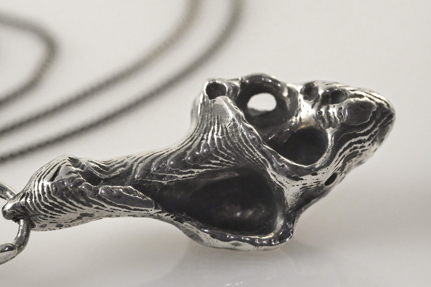 Detail of sea shell silver pendant with moonstone by VerdeRame Jewels
