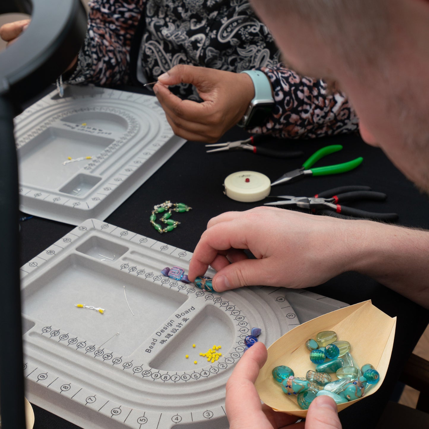 Preparation of beads for bracelet workshop at Petisco wine and tapas