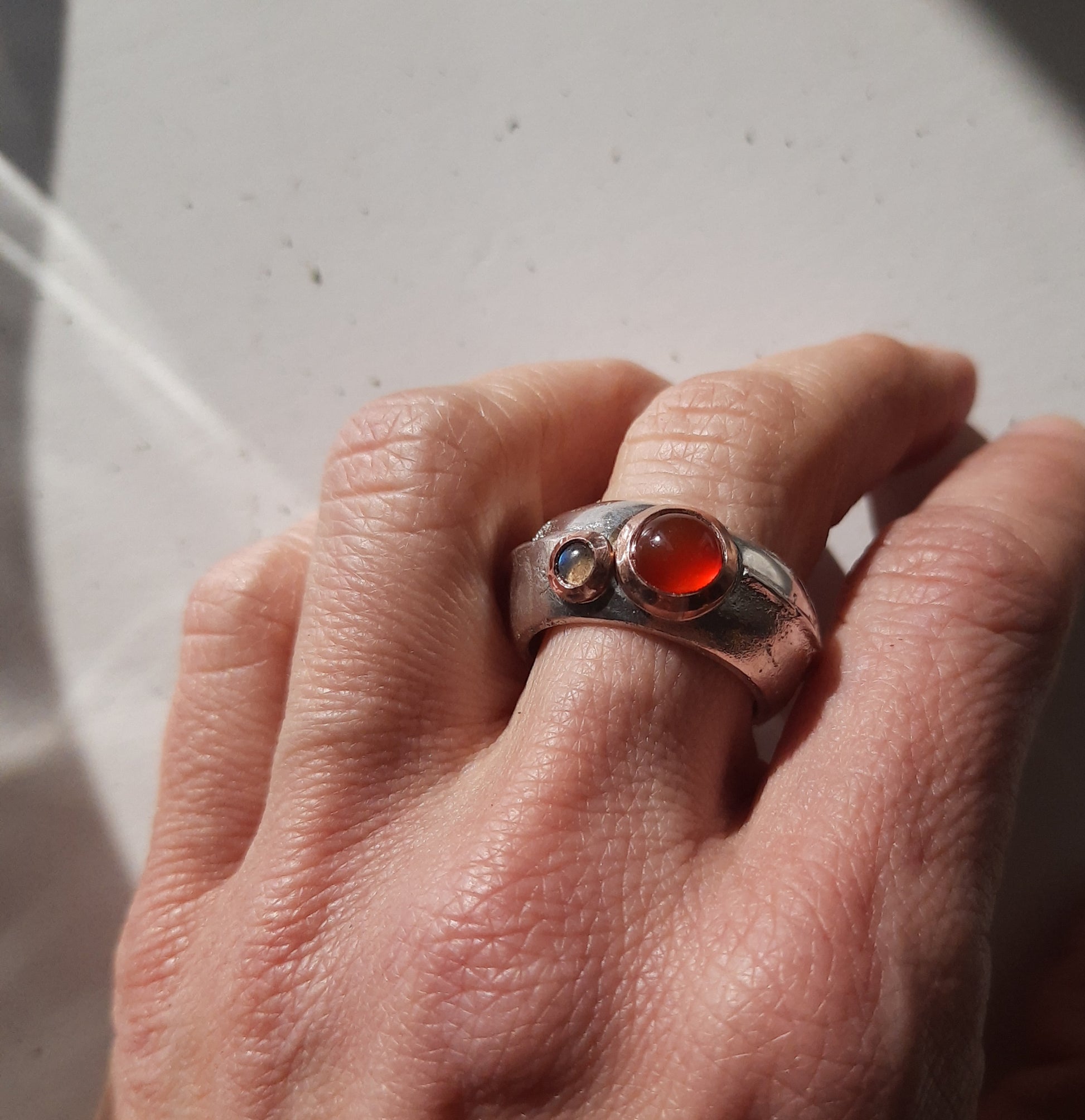 Chunky sand cast ring with carnelian and labradorite cabochons by VerdeRame Jewels