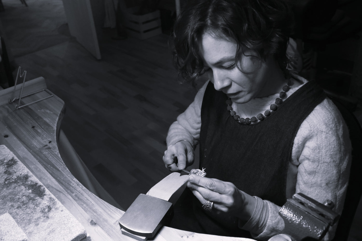 Handcrafted sterling silver frog ring being filed by artisan VerdeRame