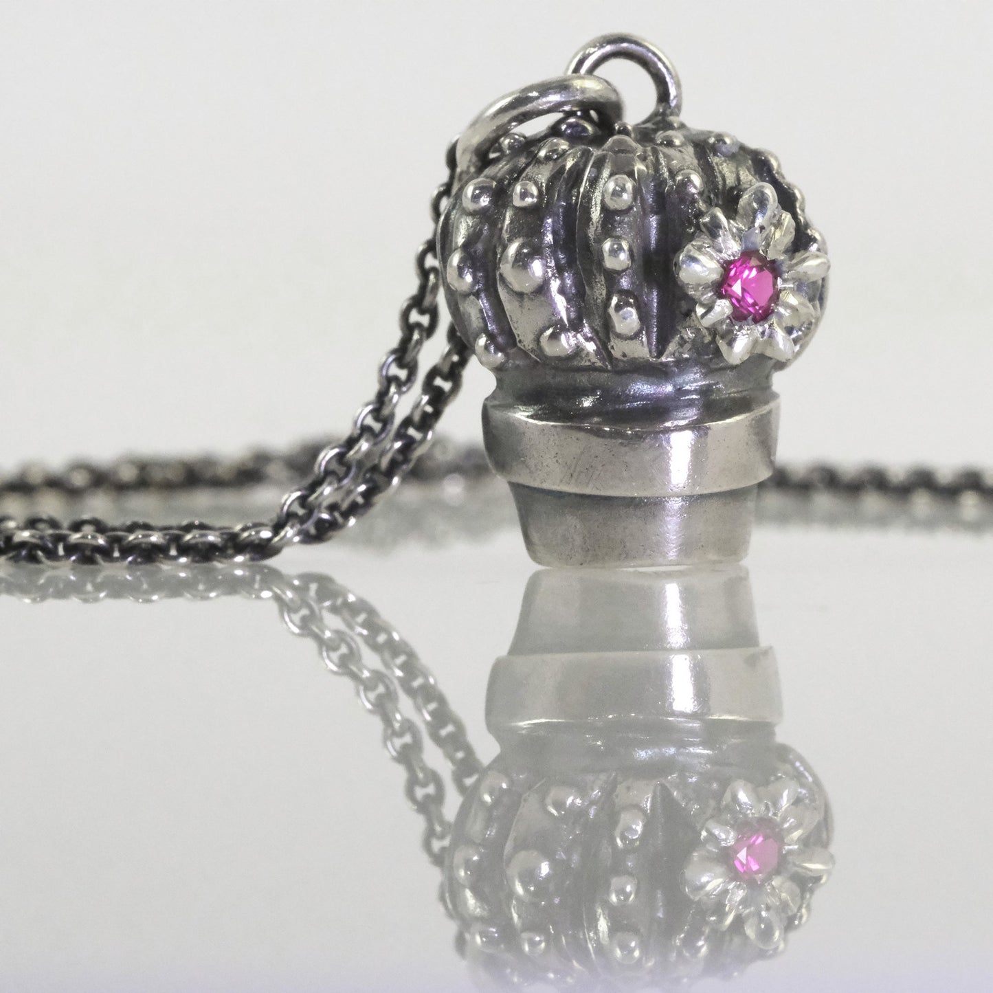 Silver cactus pendant with zirconia detail handmade by VerdeRame Jewels