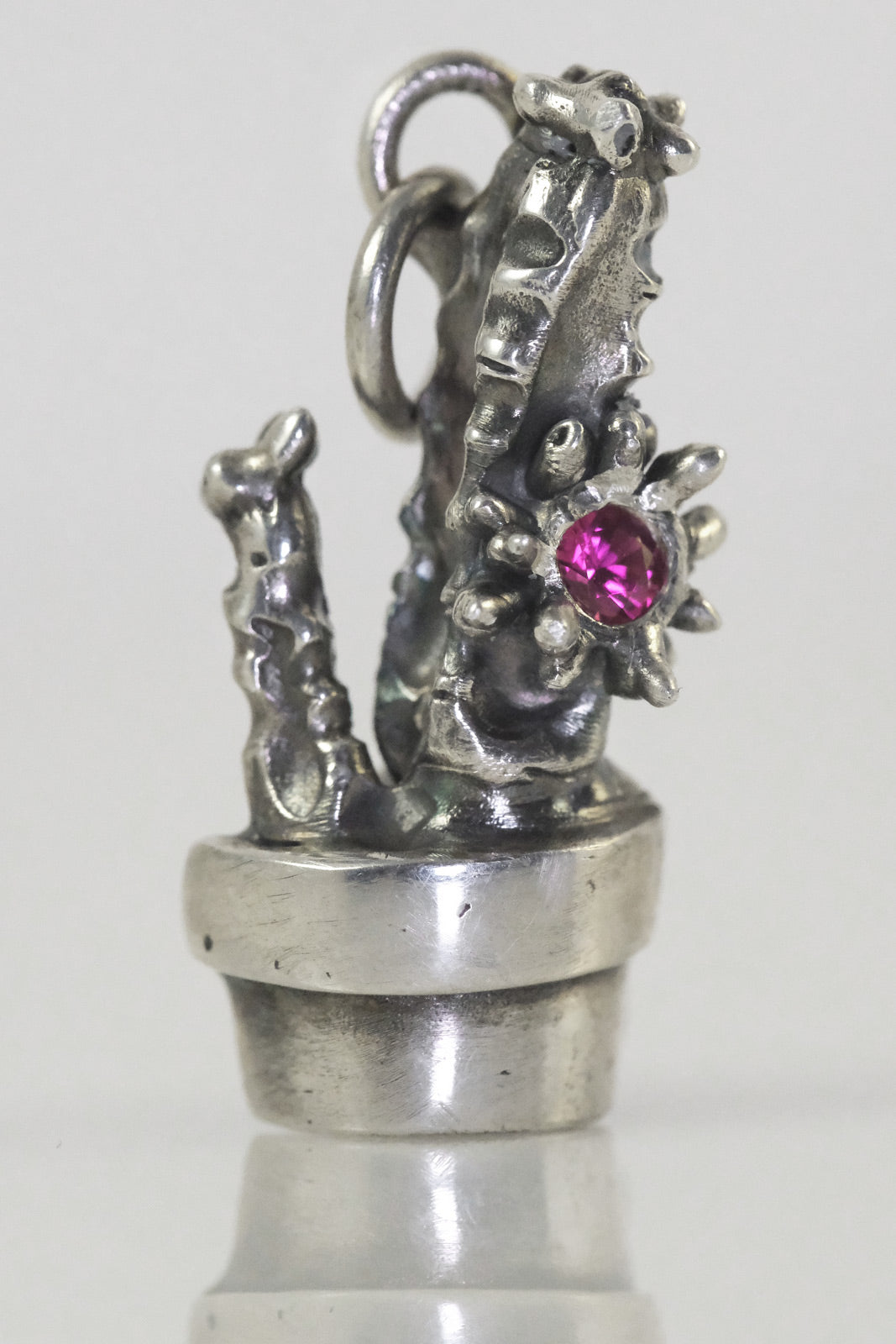 Silver cactus pendant with pink zirconia handmade by VerdeRame Jewels