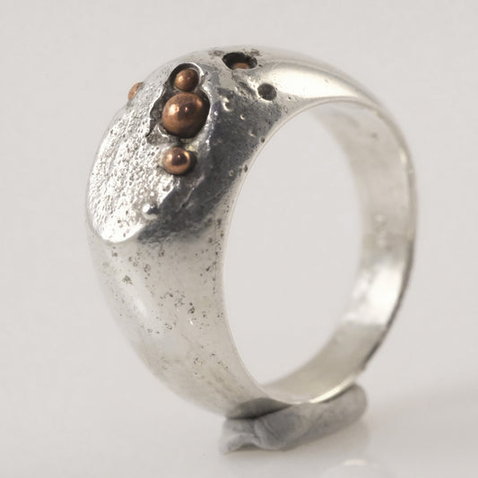 Sand-cast signet ring with copper granules handmade by VerdeRame Jewels