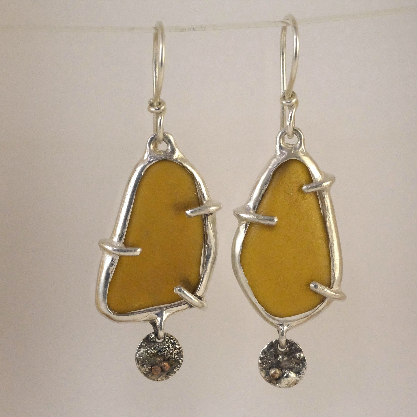 Sea glass silver dangle earrings handmade by VerdeRame Jewels