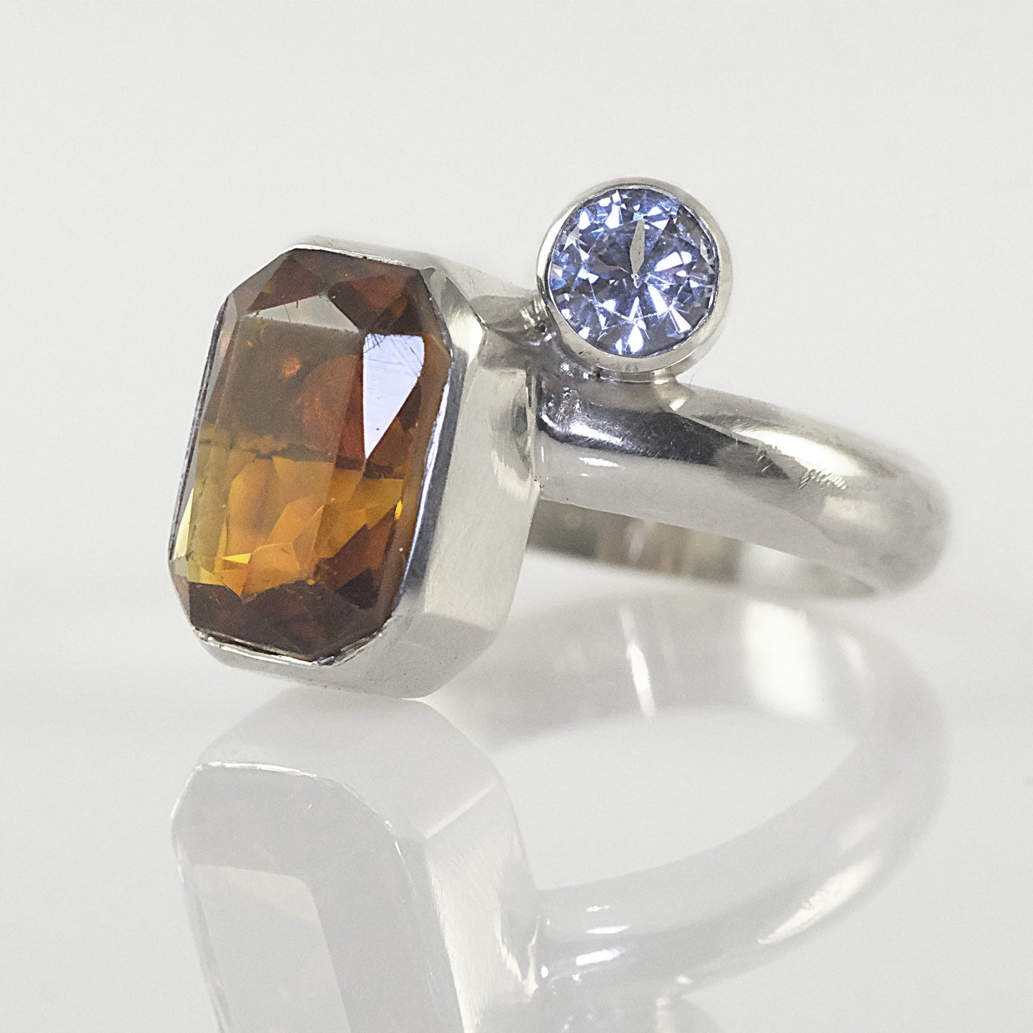 Silver cocktail ring featuring two colourful stones