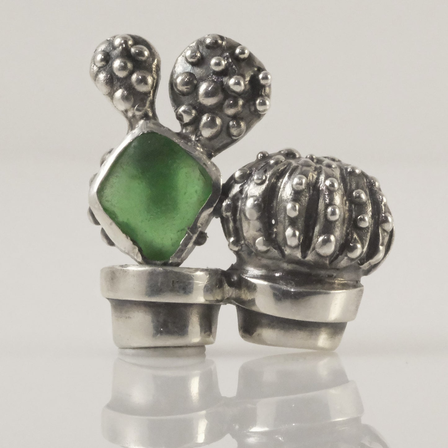 Artisan silver cacti pendant with green sea glass shard