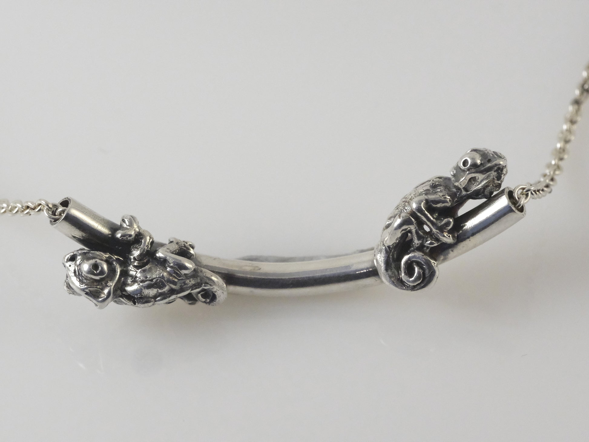 Sterling silver chameleon necklace with branch design