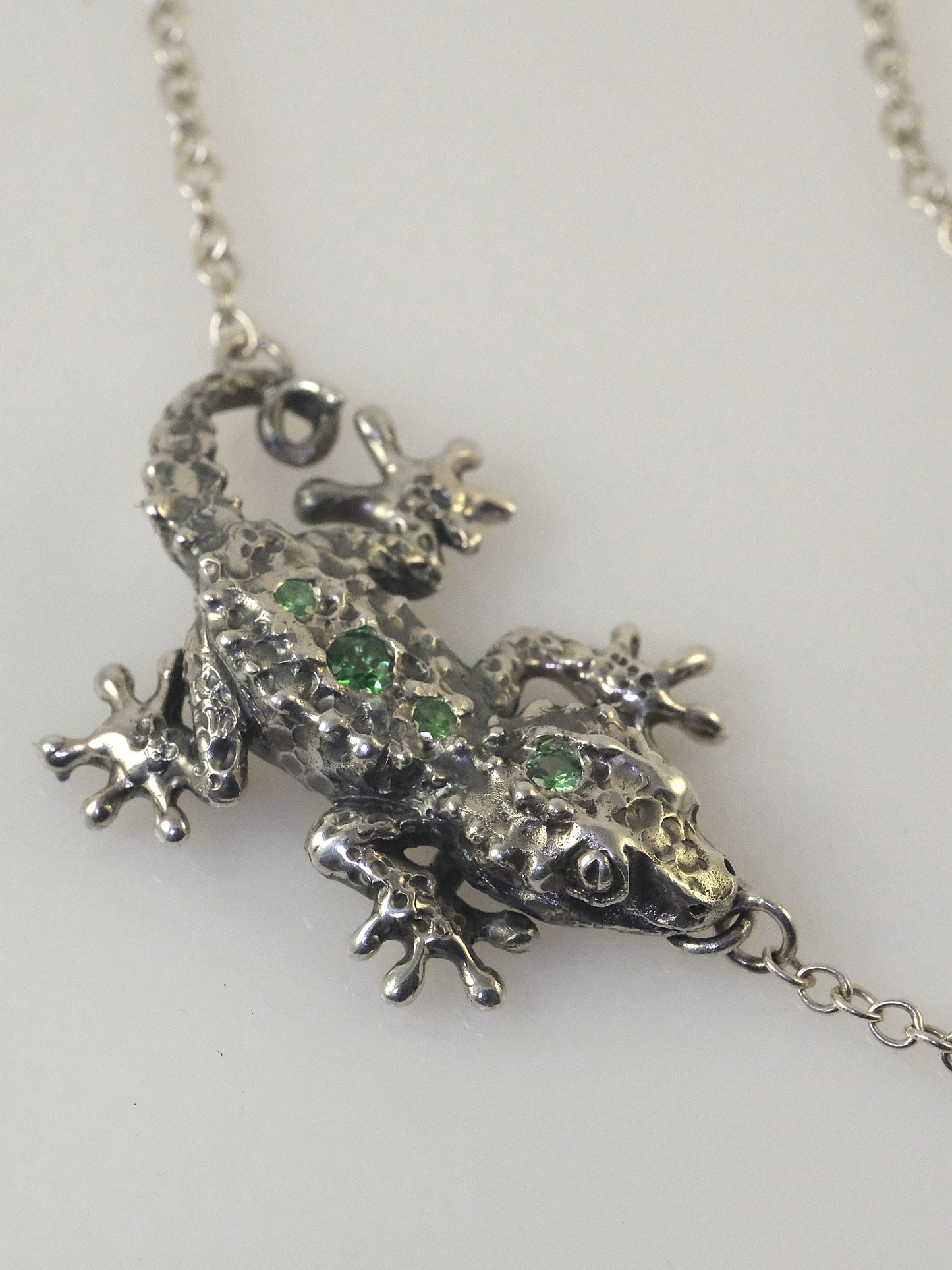 Silver gecko pendant necklace with optional tsavorite stones