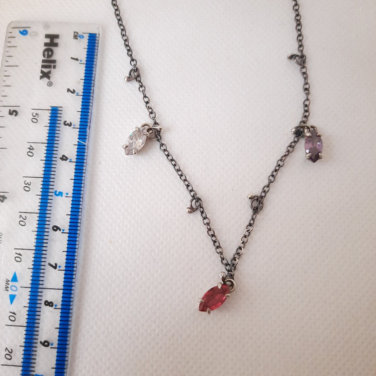 Elegant handmade oxidised silver necklace with colourful marquise crystal pendants and delicate ball charms.