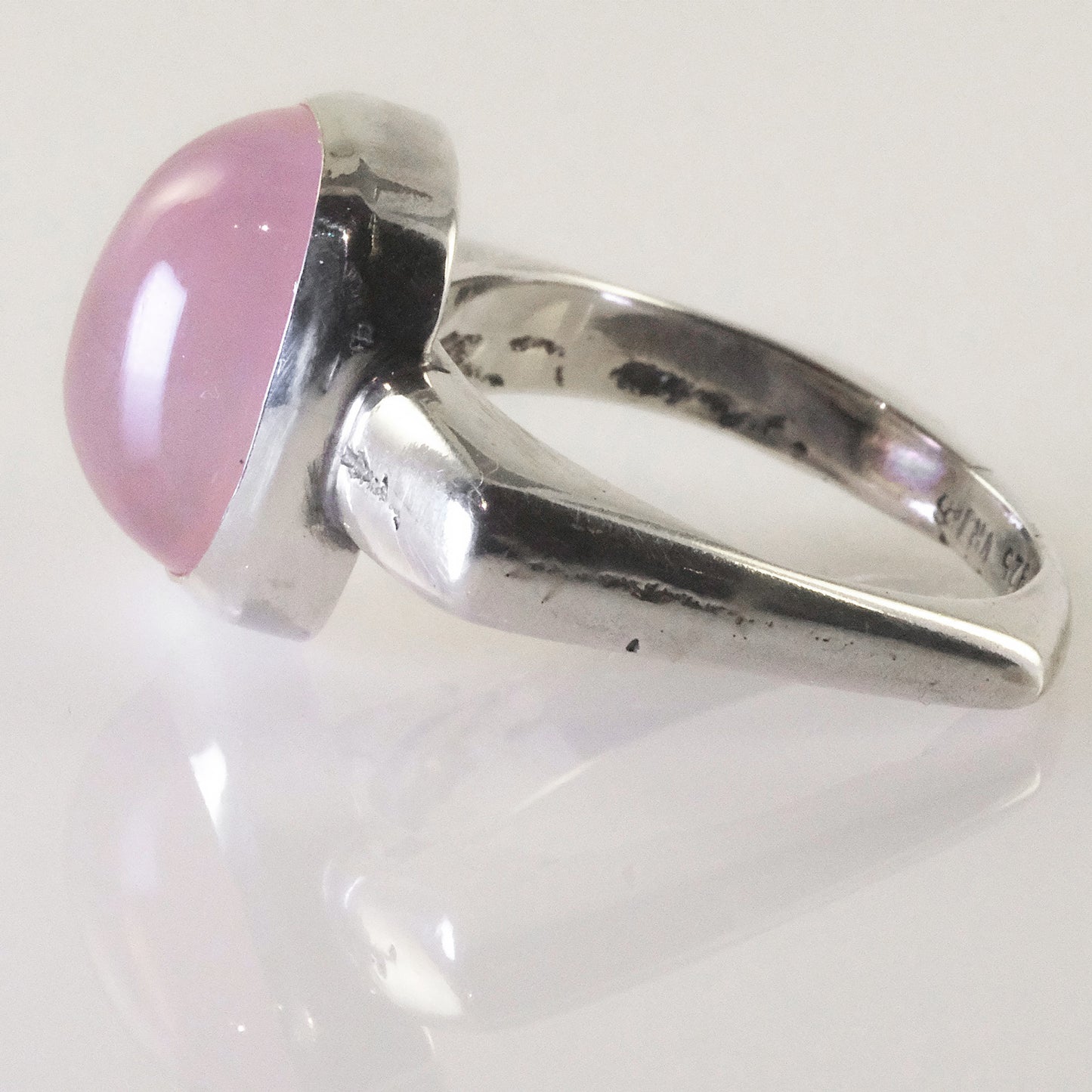 Unique artisan cocktail ring with pink quartz and geometric sand-cast silver band, VerdeRame Jewels