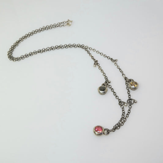Handmade sterling silver necklace with round crystal bezel pendants and small ball charms