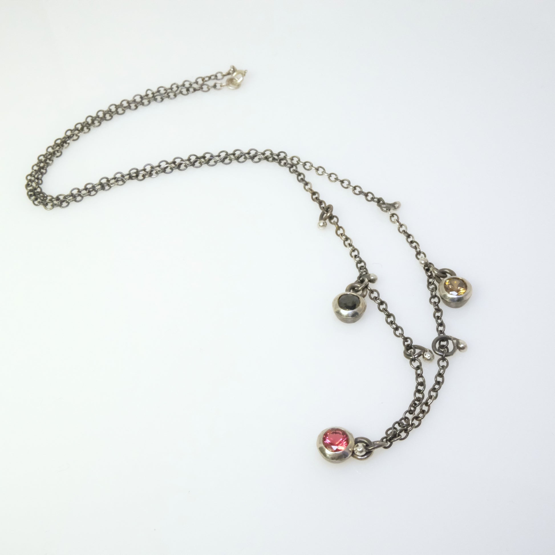 Quirky oxidised silver necklace with round crystals handmade by VerdeRame Jewels