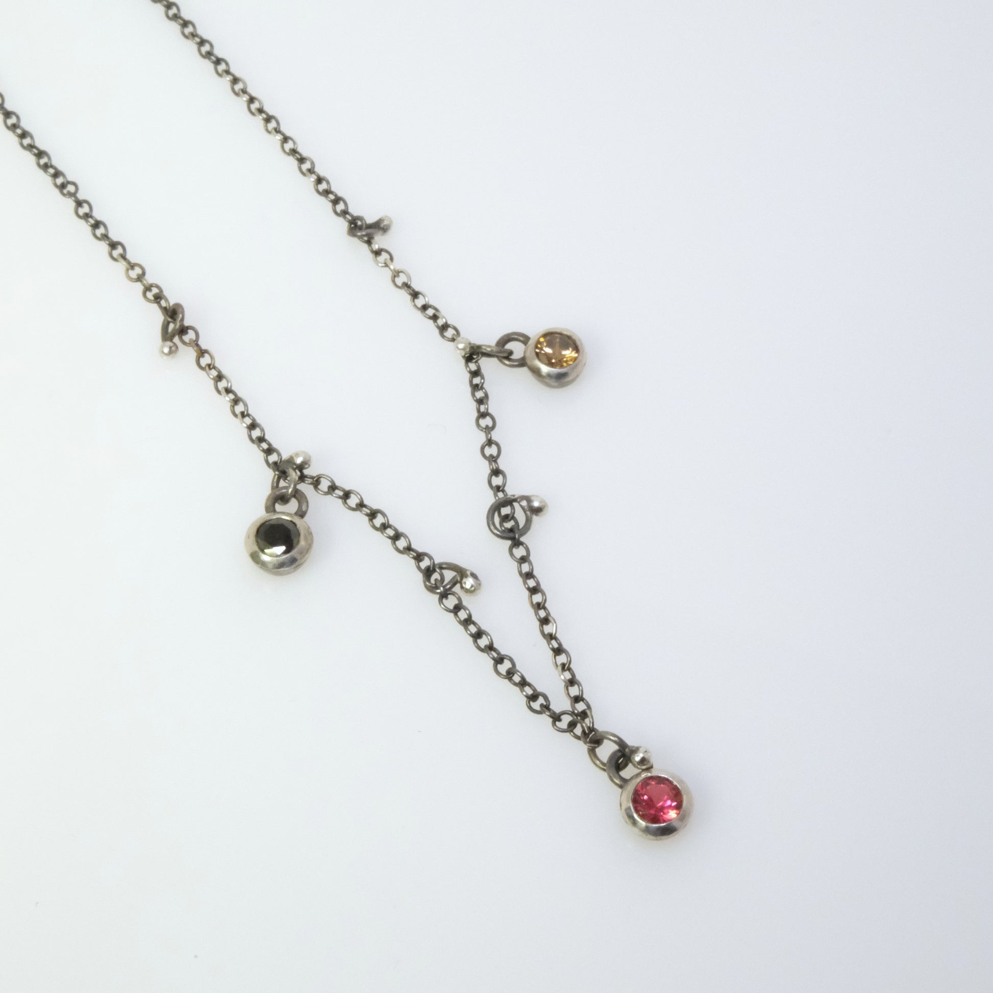 Quirky oxidised silver necklace with round crystals handmade by VerdeRame Jewels