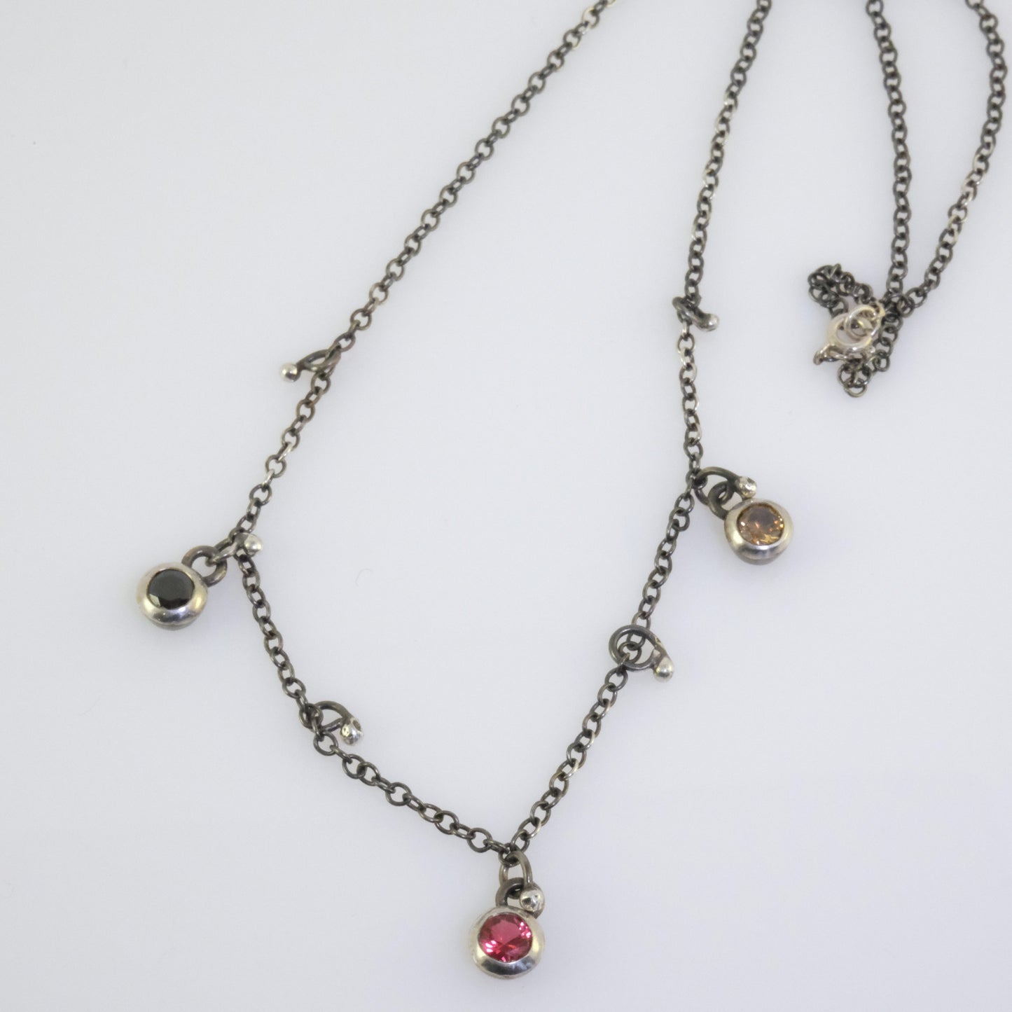 Quirky oxidised silver necklace with round crystals handmade by VerdeRame Jewels