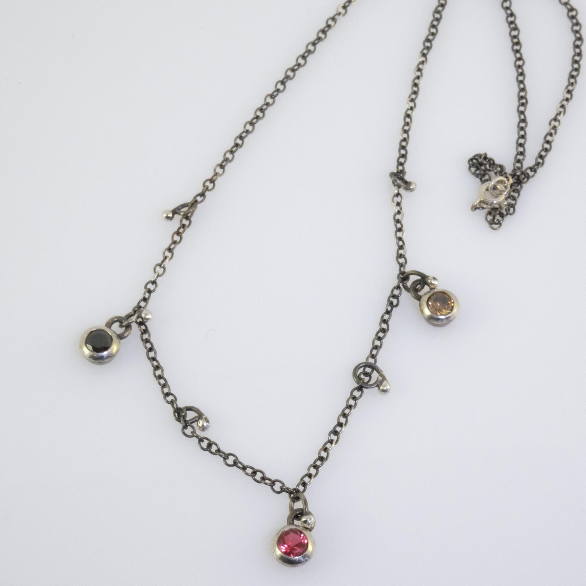 Quirky oxidised silver necklace with round crystals handmade by VerdeRame Jewels