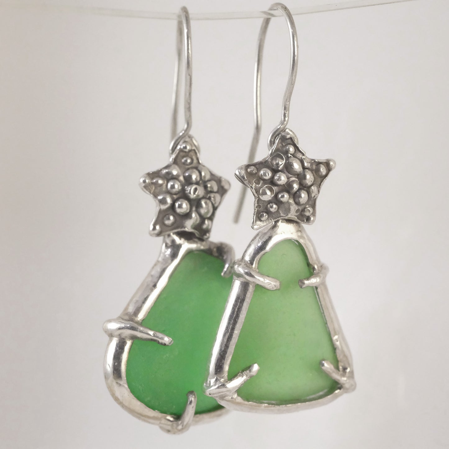 Green sea glass earrings with small silver starfish handmade jewellery