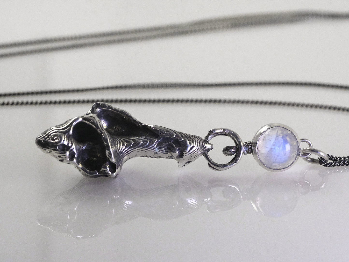 Cuttlefish cast silver seashell necklace with moonstone