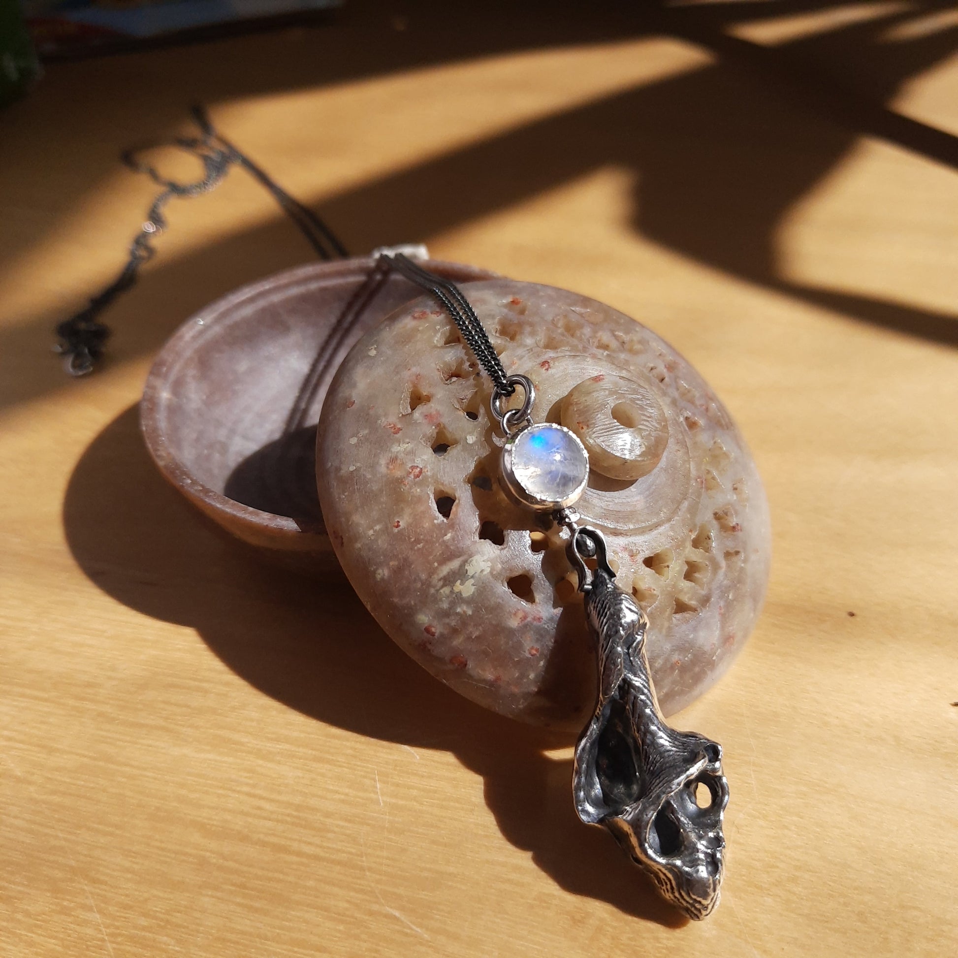 Marine-inspired silver pendant with rainbow moonstone cabochon