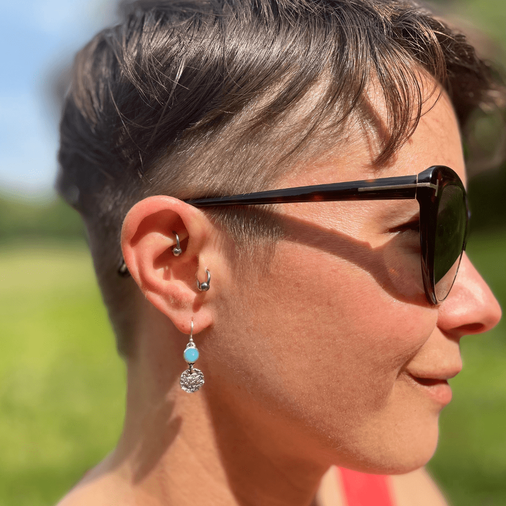 Delicate sterling silver dangle earrings inspired by the sea