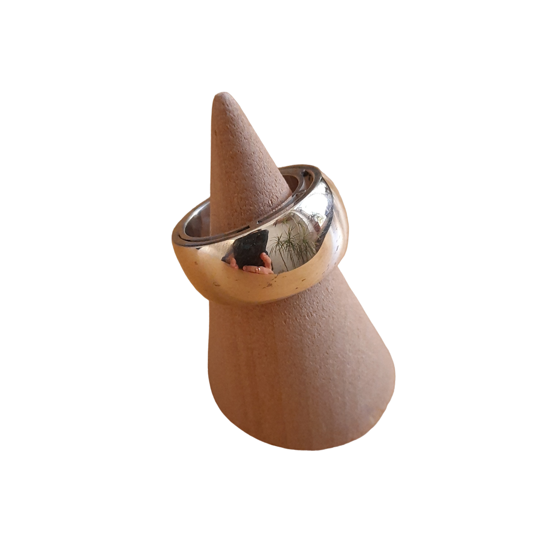 Close-up of polished 925 silver domed statement ring, handcrafted design.