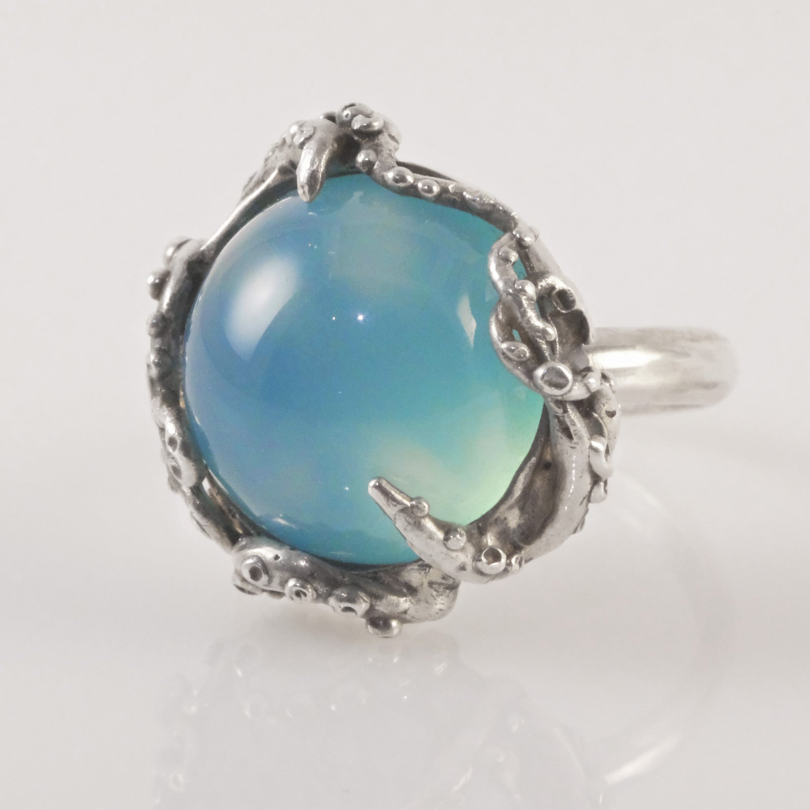 Handmade silver statement ring with octopus and blue chalcedony