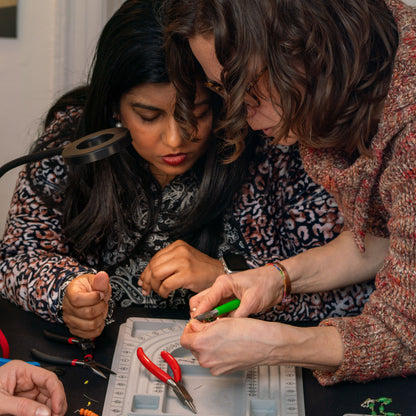 VerdeRame supervising bracelet making